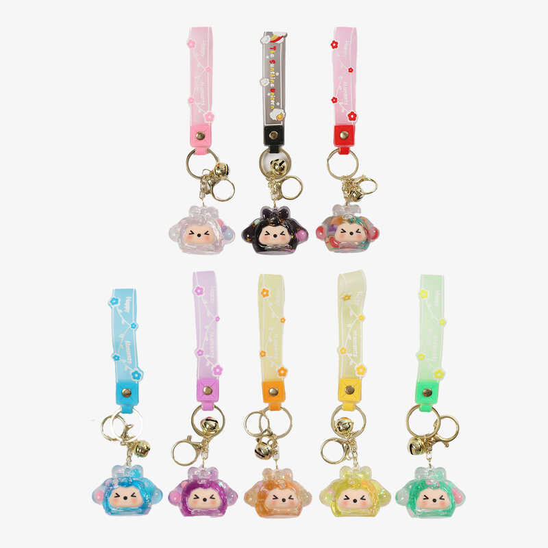 Брелок C 69947 (50) ЦІНА ЗА 12 ШТУК В УПАКОВЦІ, 6х3,5х4,5 см, металева фурнітура, наповнено рідиною, елементи всередині “плавають”, ремінець, дзвіночок, в пакеті