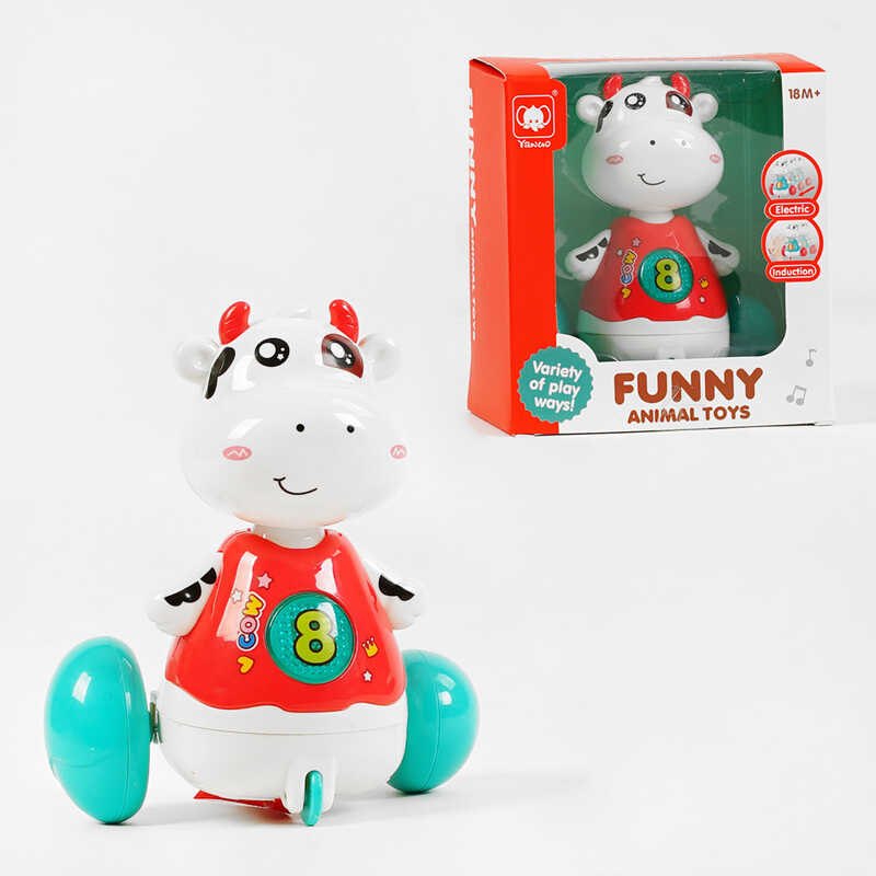 Корівка 818 (72/2) на батарейках, весела мелодія, підсвічування, рухається, реагує на плескання долонями, в коробці